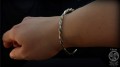 Silver & Brass Lunula Bracelet - hand 2 FB.jpg